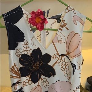 Printed dress, soft pleats & pockets.